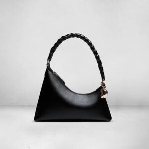 AUPEN Nirvana Noir Handbag as seen on Taylor Swift